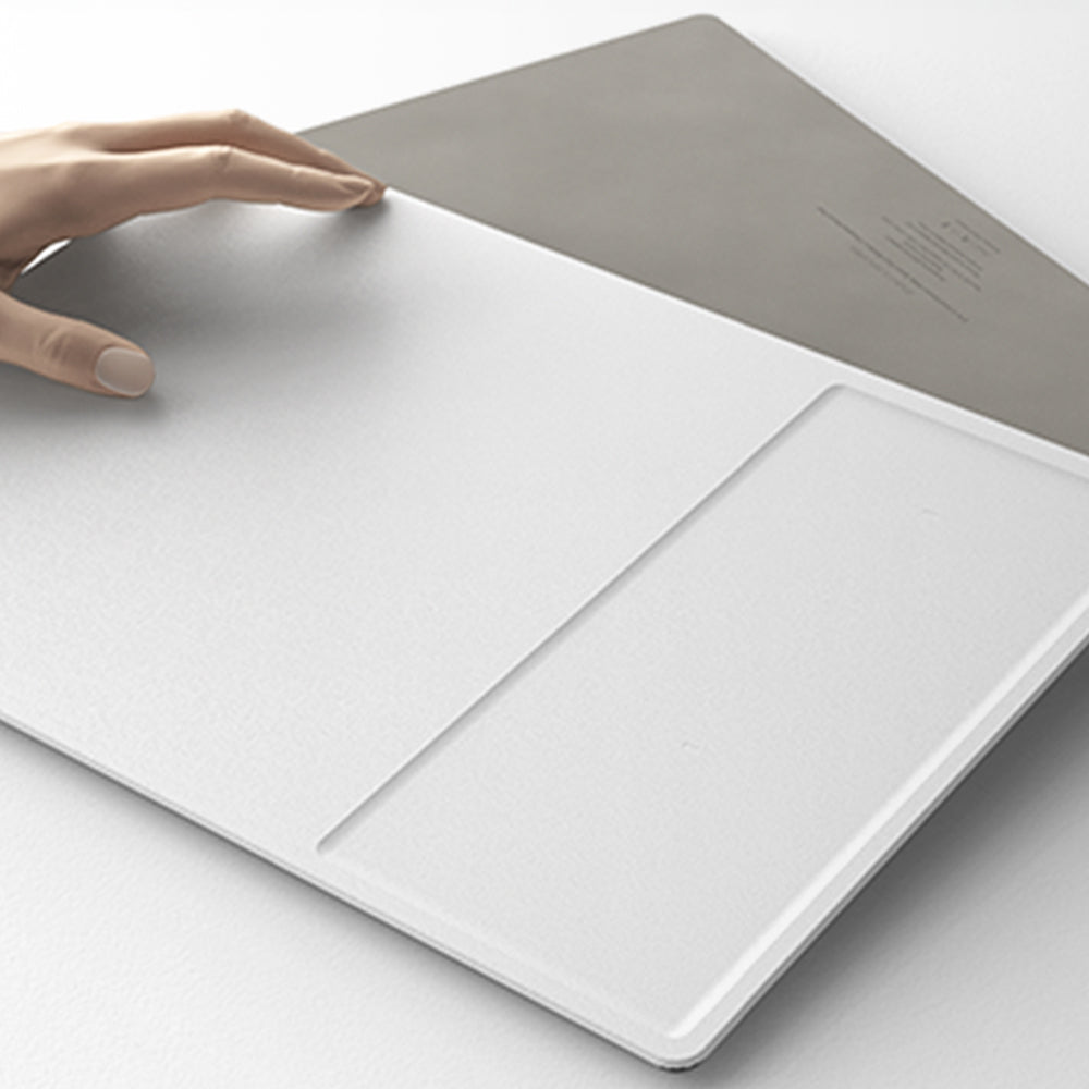Crafted with high-end polyurethane vegan leather, the pad’s ultra-smooth surface adds a touch of sophistication to your workspace. The color-matched braided charging cable completes the premium aesthetic for a polished and professional look. 