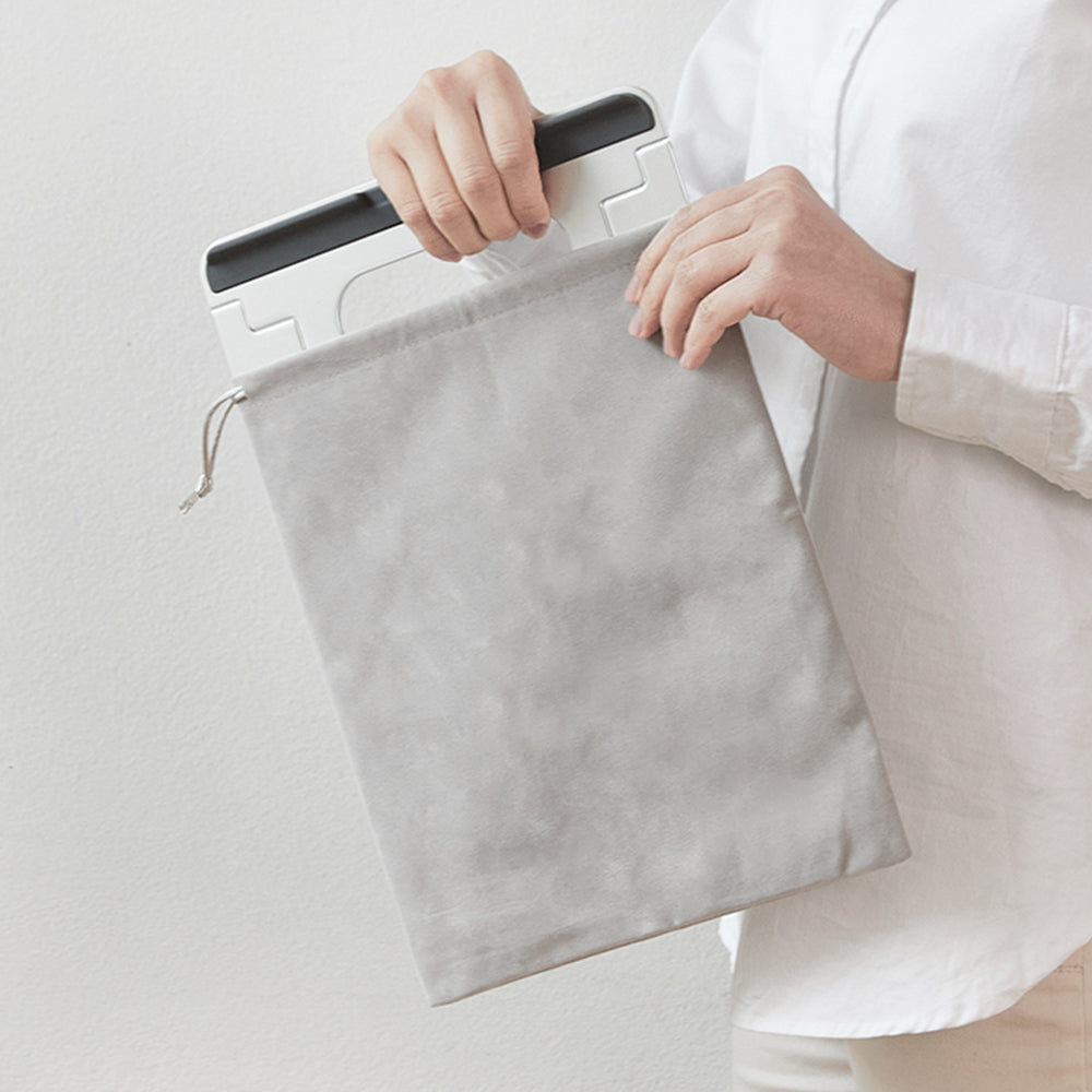 Its lightweight and foldable design makes it easy to carry in a bag or briefcase, allowing you to work comfortably at home, in the office, or while traveling. The stand is made from premium aluminum with an anodized powder-coated finish, ensuring durability and sleek aesthetics. 