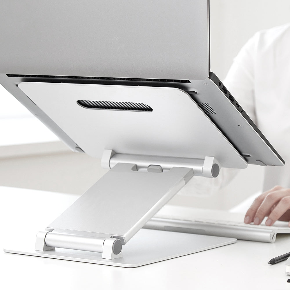 Designed to enhance your workspace without the need for a standing desk, this laptop riser helps you achieve optimal viewing angles, reducing neck and back strain while promoting better posture. The height & angle adjustability ensures a comfortable setup for both sitting and standing positions.